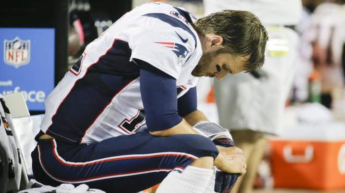 
New England Patriots quarterback Tom Brady sits on the bench during a loss to the Kansas City Chiefs, Monday, Sept. 29, 2014, in Kansas City, Mo. 

