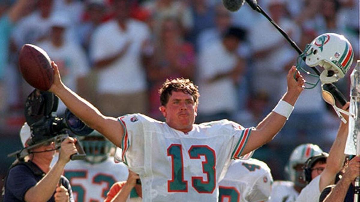 Miami Dolphins quarterback Dan Marino celebrates early in his career. He was selected 27th overall in the 1983 NFL Draft.