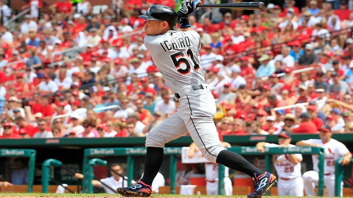 Miami Marlins' Ichiro Suzuki follows through on a double during the sixth inning of a baseball game against the St. Louis Cardinals Sun., July 17, 2016, in St. Louis.