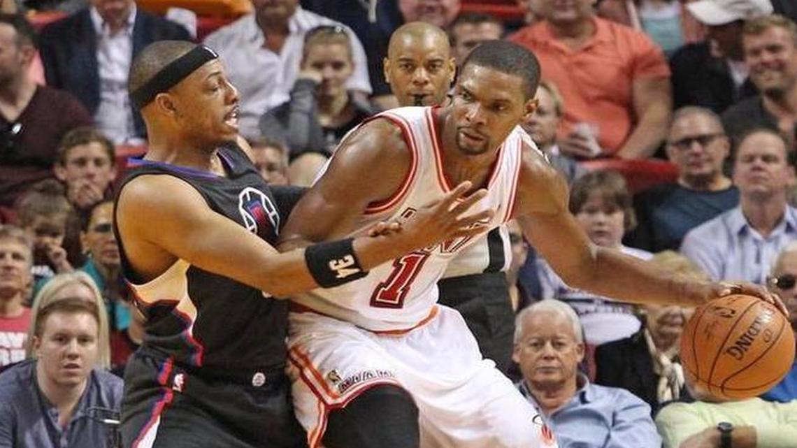 Former Celtics and then-Clippers star Paul Pierce, seen here defending former Heat great Chris Bosh in a February 2016 game, disagrees with Pat Riley’s comments about where the Heat stands in the NBA hierarchy.