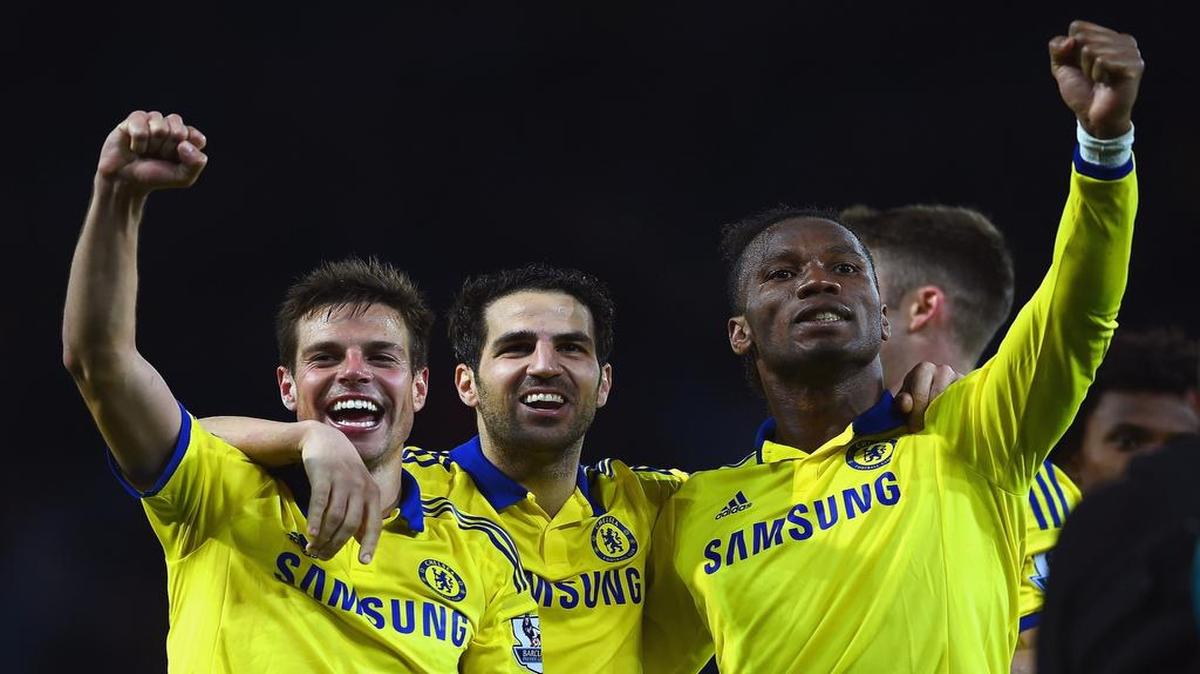 
From right: Didier Drogba, Cesc Fabregas and Cesar Azpilicueta of Chelsea celebrate winning 3-1 after the Barclays Premier League match between Leicester City and Chelsea at The King Power Stadium in Leicester, England on April 29, 2015.
