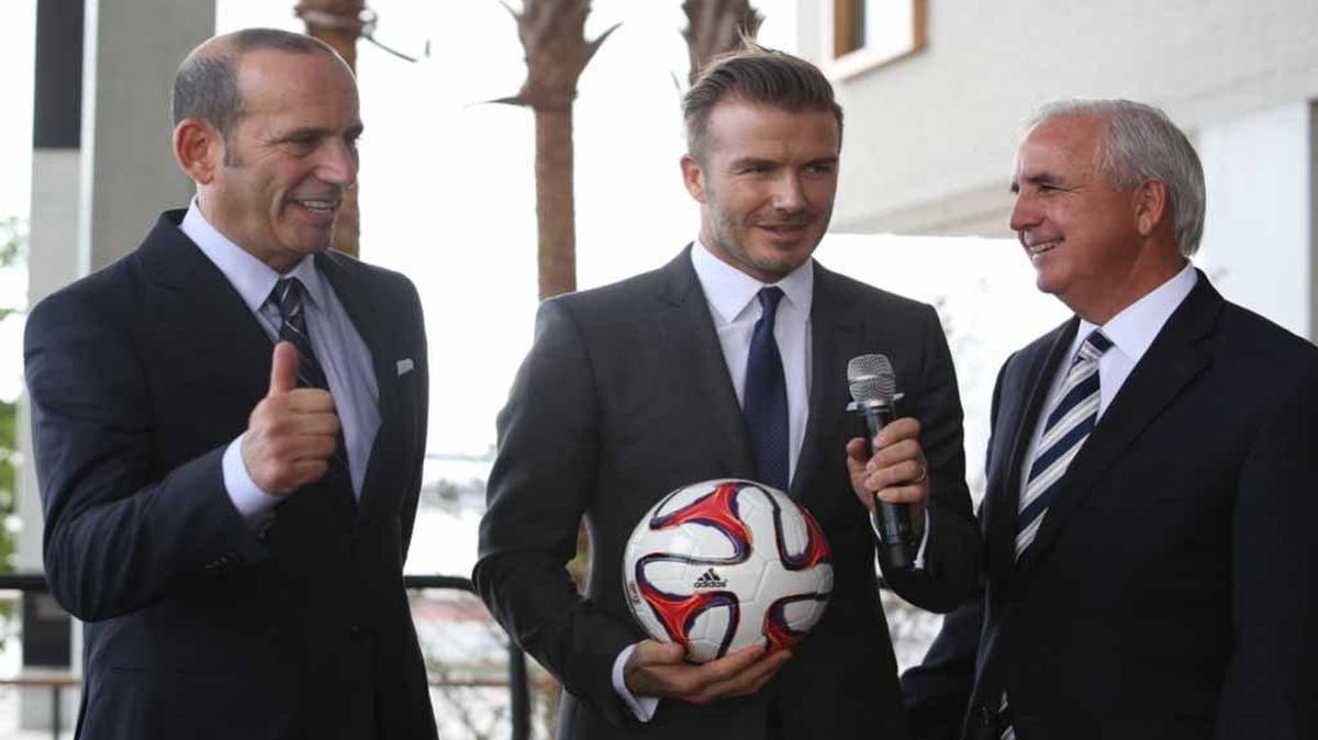 
David Beckham, center, stands with MLS commissioner Don Garber, left, and Miami-Dade mayor Carlos Gimenez, right, at a news conference at Perez Art Museum Miami in 2014.
