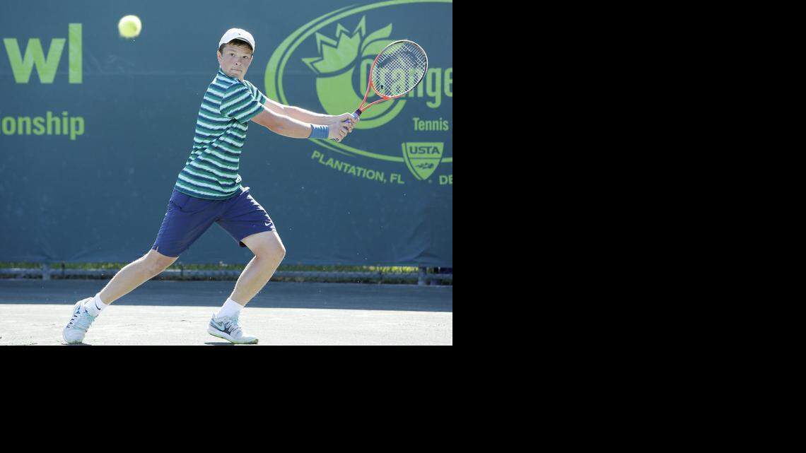 
Stefan Kozlov of Pembroke Pines plays against Stefanos Tsitsipas (Greece) during the Metropolia Orange Bowl International Tennis Championship Boys 18s final match on Sunday, Dec. 14, 2014, at Frank Veltri Tennis Center in Plantation.
