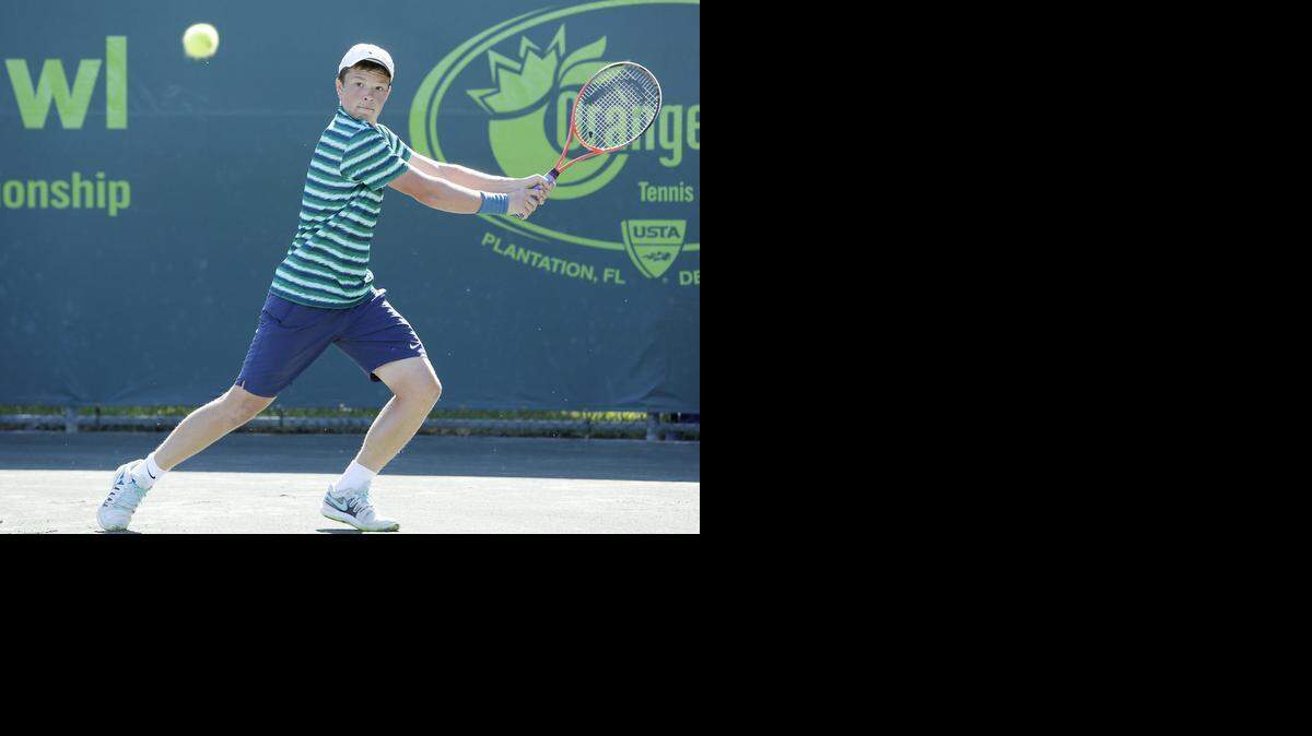 
Stefan Kozlov of Pembroke Pines plays against Stefanos Tsitsipas (Greece) during the Metropolia Orange Bowl International Tennis Championship Boys 18s final match on Sunday, Dec. 14, 2014, at Frank Veltri Tennis Center in Plantation.
