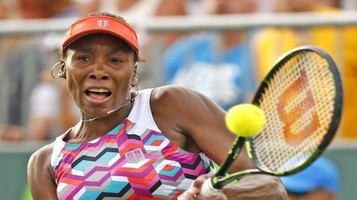 
rock solid: Venus Williams belts a return during her victory over Samantha Stosur on Saturday.
