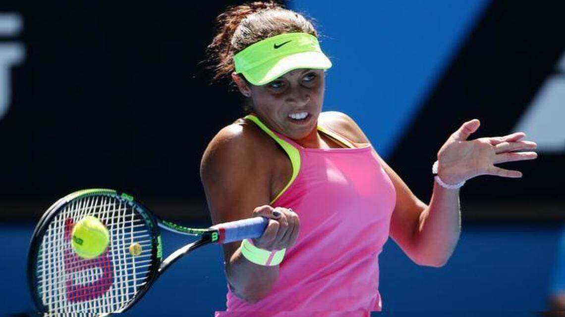 
Madison Keys returns a shot during a match against Venus Williams in the quarterfinals of the Australian Open in Melbourne, Australia, Wednesday, Jan. 28, 2015. 
