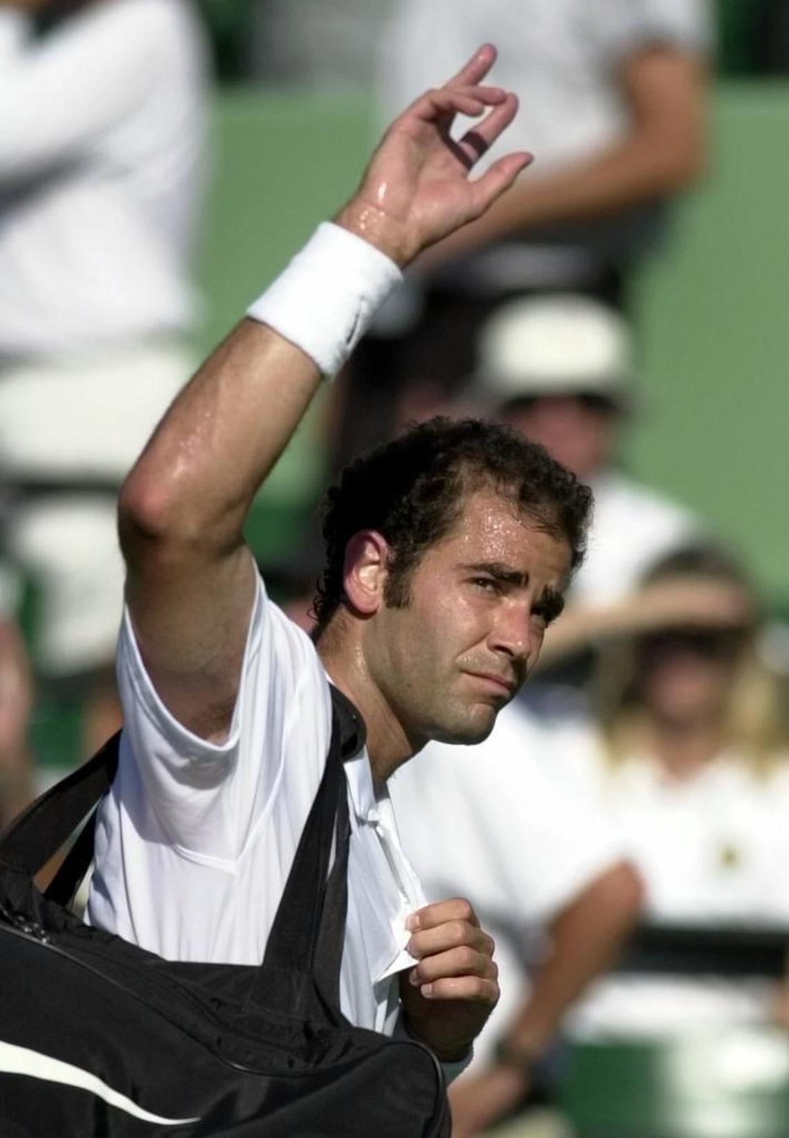 Pete Sampras acknowledges the crowd as he leaves the stadium after losing to Fernando Gonzalez of Chile, in the Nasdaq-100 Open on March 25, 2002, in Key Biscayne. Gonzalez beat No. 11-seeded Sampras 7-6 (1), 6-1.
