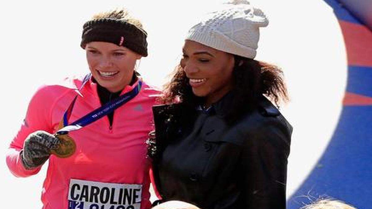 On Nov. 2:  Caroline Wozniacki revels with Serena Williams after finishing the New York Marathon.