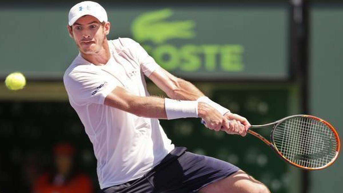 
Andy Murray hits a backhand return during his victory against Tomas Berdych in the Miami Open semifinals Friday, April 3, 2015.
