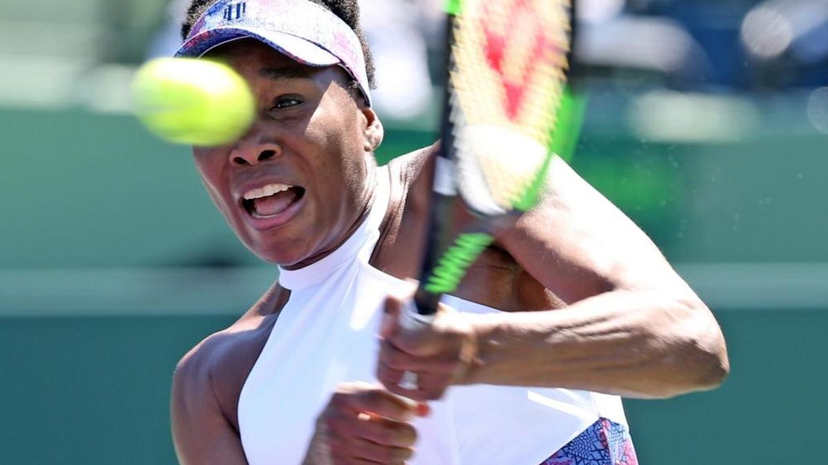 Venus Williams returns a ball to Kiki Bertens at the Miami Open on Key Biscayne, Florida, March 25, 2018.