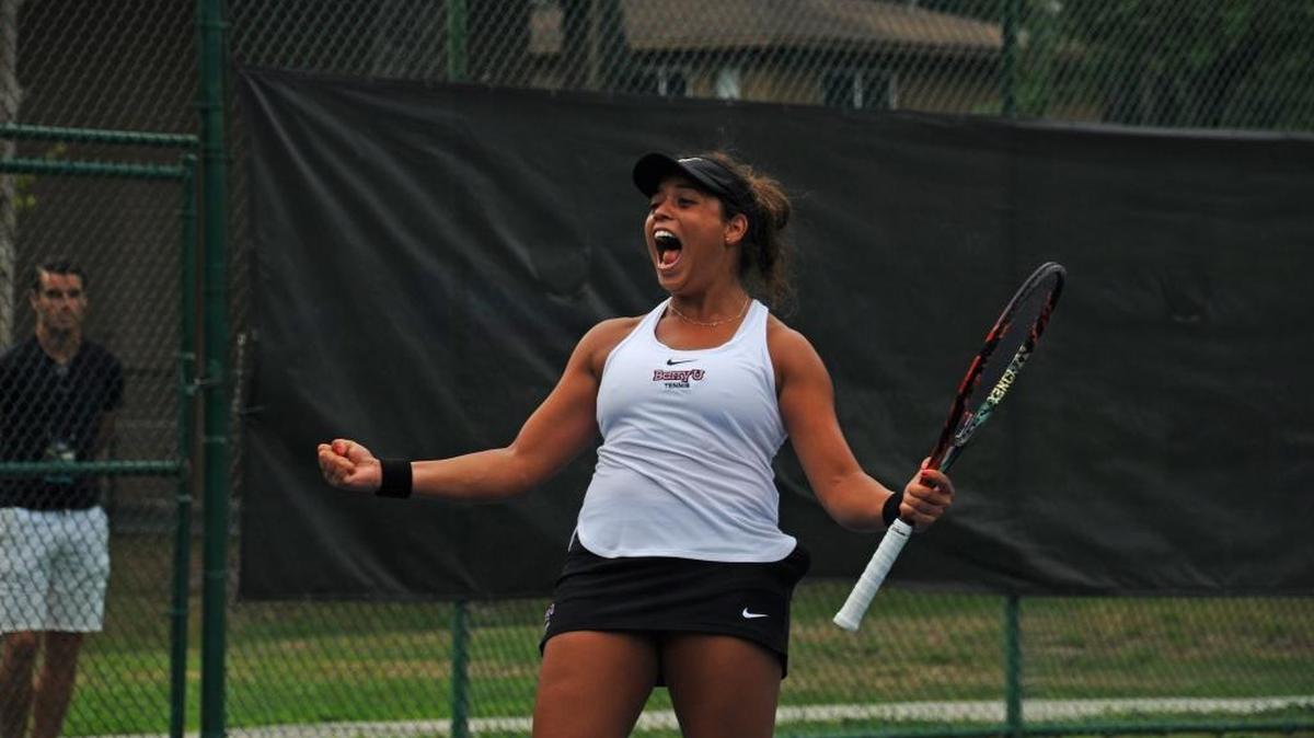 Ana Pain of Barry University’s Buccaneers women’s tennis team screams in celebration.