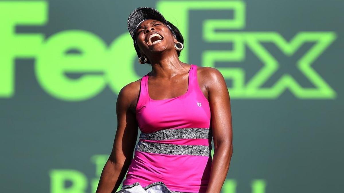 Venus Williams reacts to a rare poor shot to Patricia Maria Tig during today's match at the Miami Open at the Crandon Park Tennis Center on Key Biscayne on Sunday, March 26, 2017.