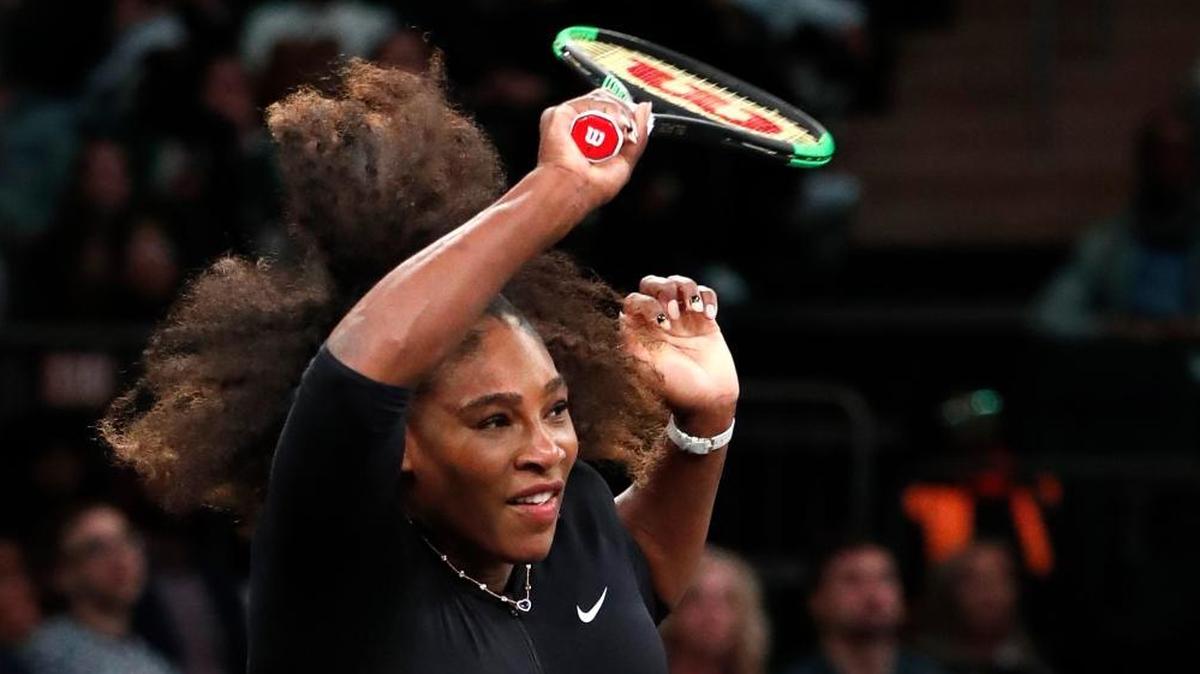 Serena Williams of the United States swings through on a return to Marion Bartoli during the Tie Break Tens tournament at Madison Square Garden on March 5, 2018, in New York. The Tie Break Tens' New York event is a one-day exhibition tournament featuring eight female players competing for a $250,000 winner's prize.