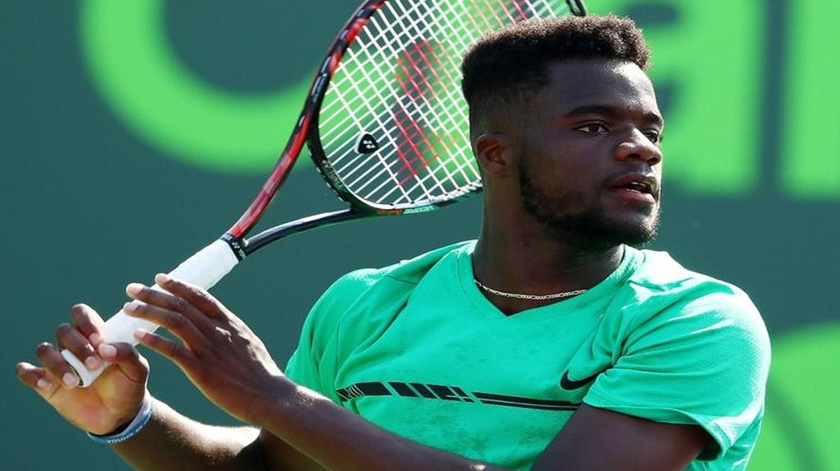 Frances Tiafoe returns a shot against Konstanin Kravchuk of Russia during Day 4 of the Miami Open at Crandon Park Tennis Center on March 23, 2017 in Key Biscayne, Florida.