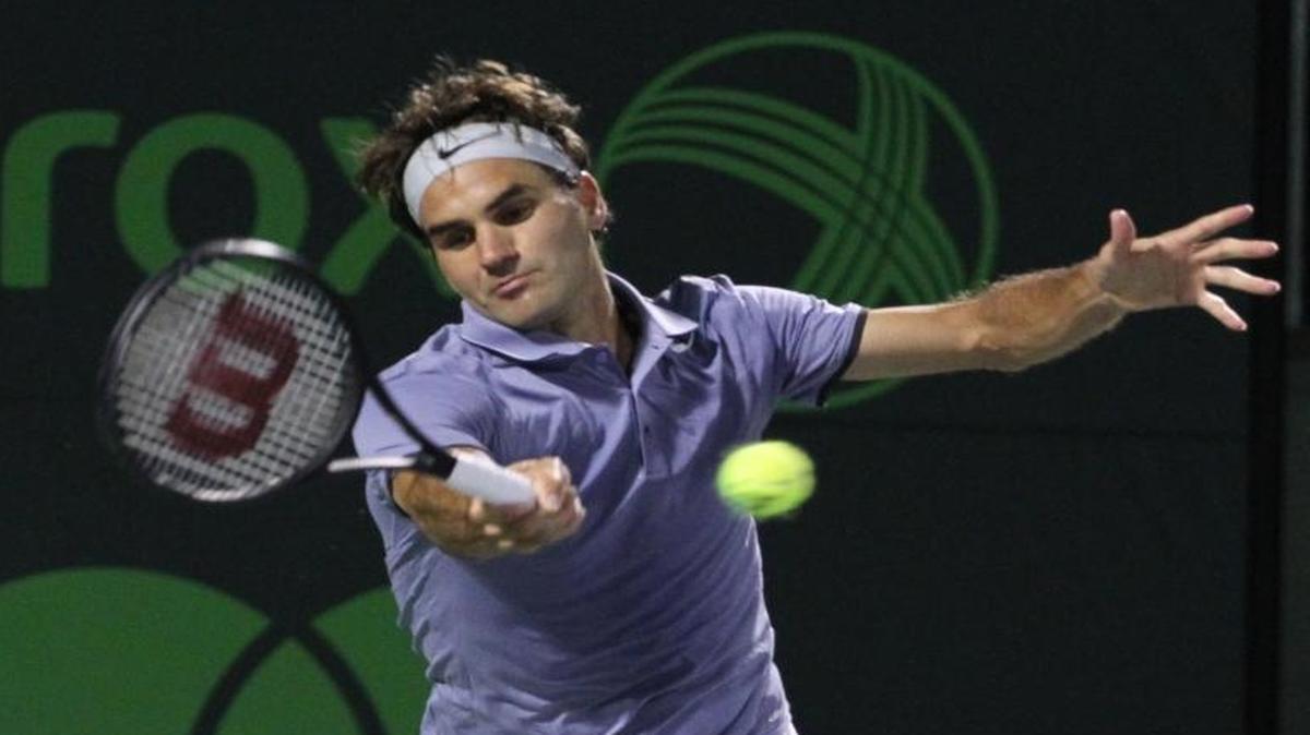Roger Federer returns a shot against Kei Nishikori in the 2014 Sony Open Tennis in Key Biscayne, Fla. Federer announced that he is planning play in the Miami Open on Key Biscayne from March 20 to April 2, 2017.