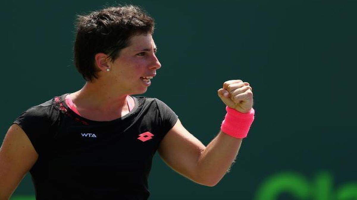 
Carla Suarez Navarro celebrates her 6-3, 6-3 victory against Andrea Petkovic in the semifinals of the Miami Open at Crandon Park Tennis Center on Thursday. 

