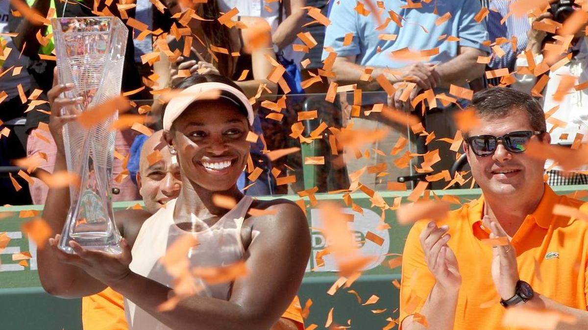 Sloane Stephens holds her trophy after defeating Jelena Ostapenko of Latvia, 7-6 (7-5), 6-1, to win the Miami Open for the first time at Crandon Park Tennis Center in Key Biscayne on March 31, 2018.