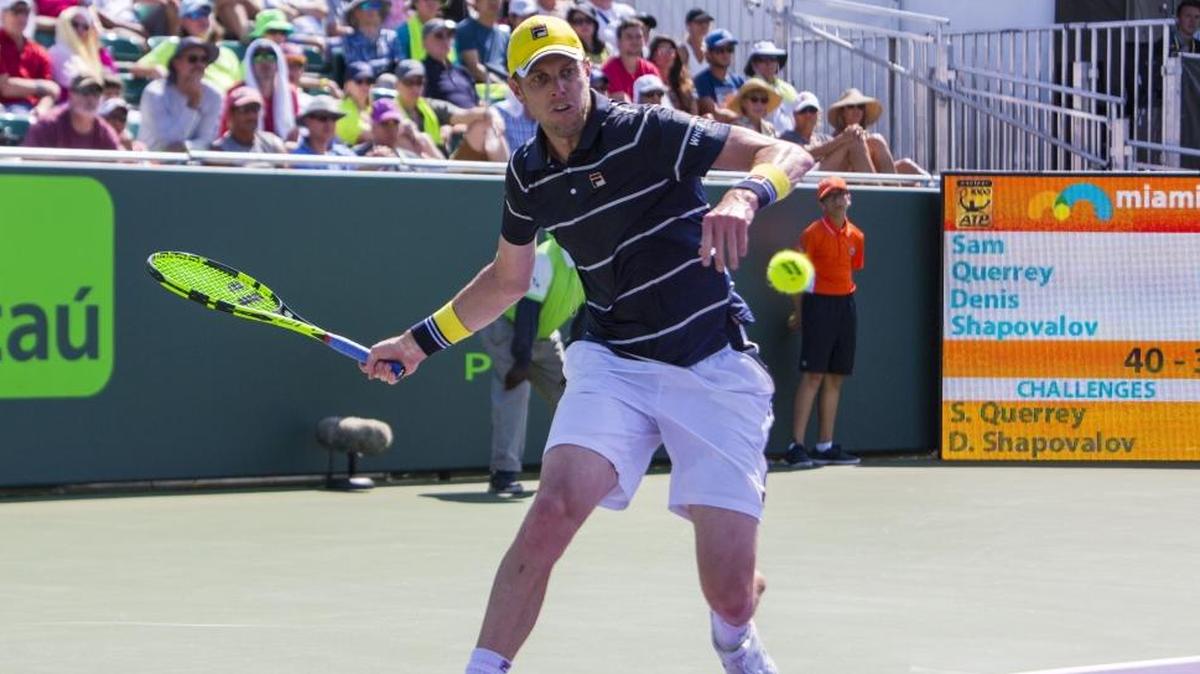 Sam Querrey returns the ball to Denis Shapovalov during the Miami Open tennis tournament in Key Biscayne, FL, Mon., March 26, 2018.