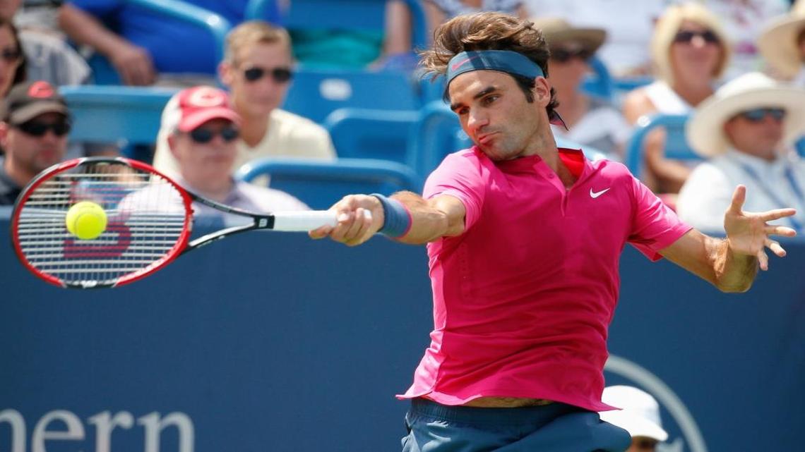 
Roger Federer, of Switzerland, returns the ball to Novak Djokovic, of Serbia, during a final match at the Western & Southern Open tennis tournament in Mason, Ohio. Djokovic is the No. 1 seed for the 2015 U.S. Open. Federer is seeded second.
