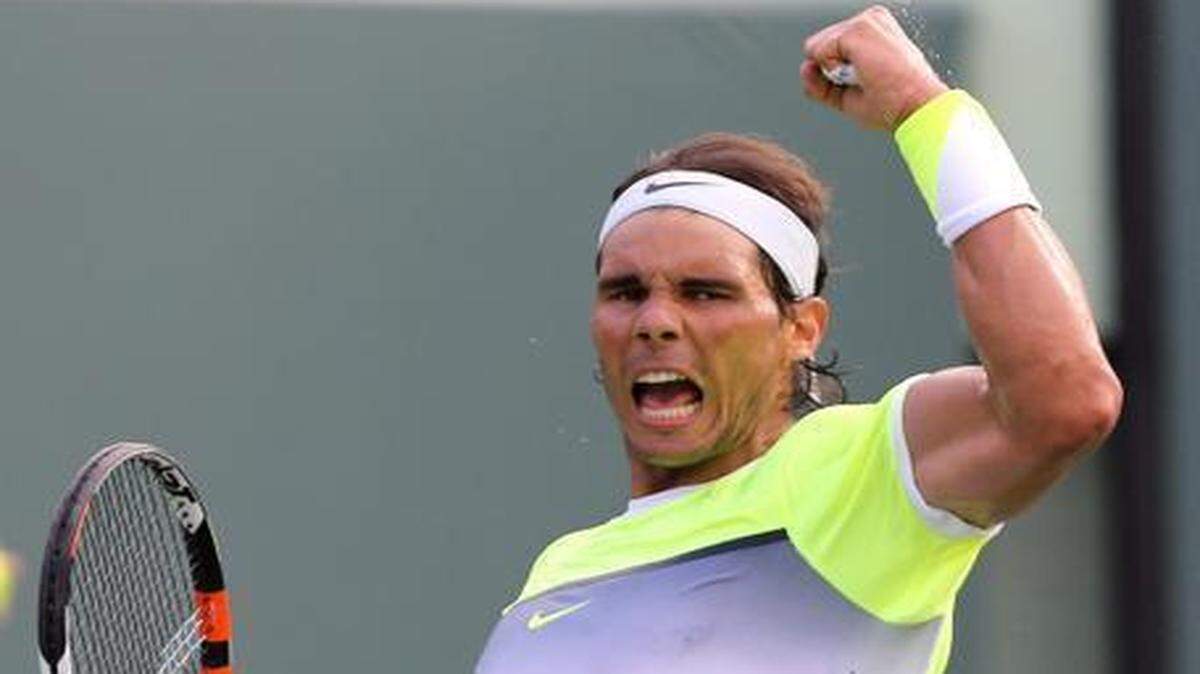 
Rafael Nadal celebrates after winning the first set against Nicolas Almagro at the Miami Open on Key Biscayne, Florida, March 27, 2015. 
