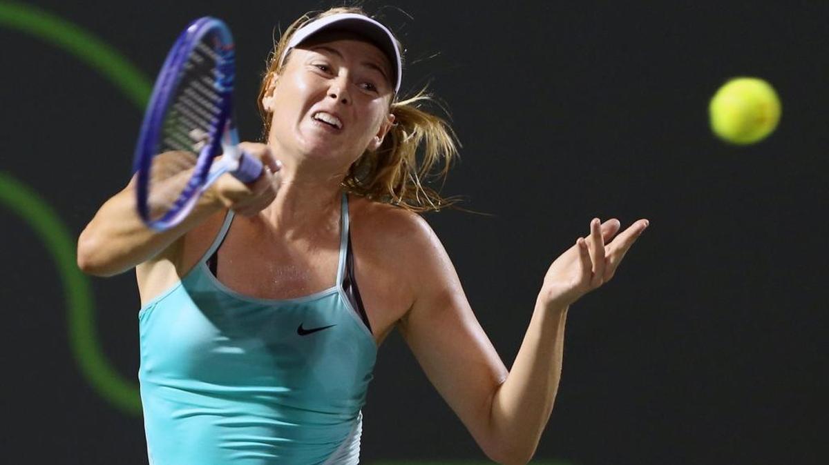 Maria Sharapova returns a ball at the Miami Open in Key Biscayne, Florida, March 26, 2015.