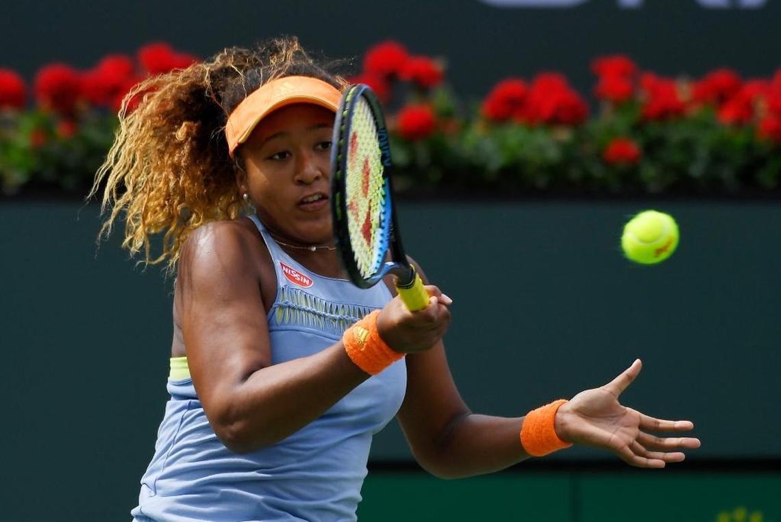 Naomi Osaka, of Japan, returns a shot to Daria Kasatkina, of Russia, in the women's final at the BNP Paribas Open tennis tournament on March 18, 2018, in Indian Wells, Calif. Osaka won 6-3, 6-2.