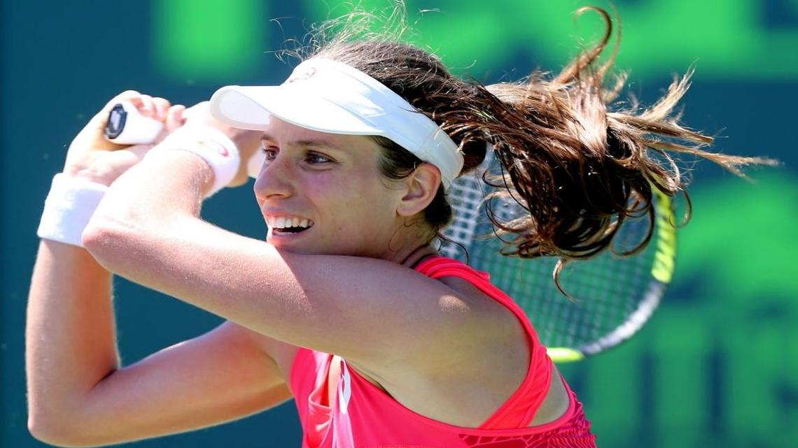 Johanna Konta returns a ball hit by Simona Halep, Konta defeated Halep in three sets at the Miami Open on Key Biscayne, Florida, March 29, 2017.