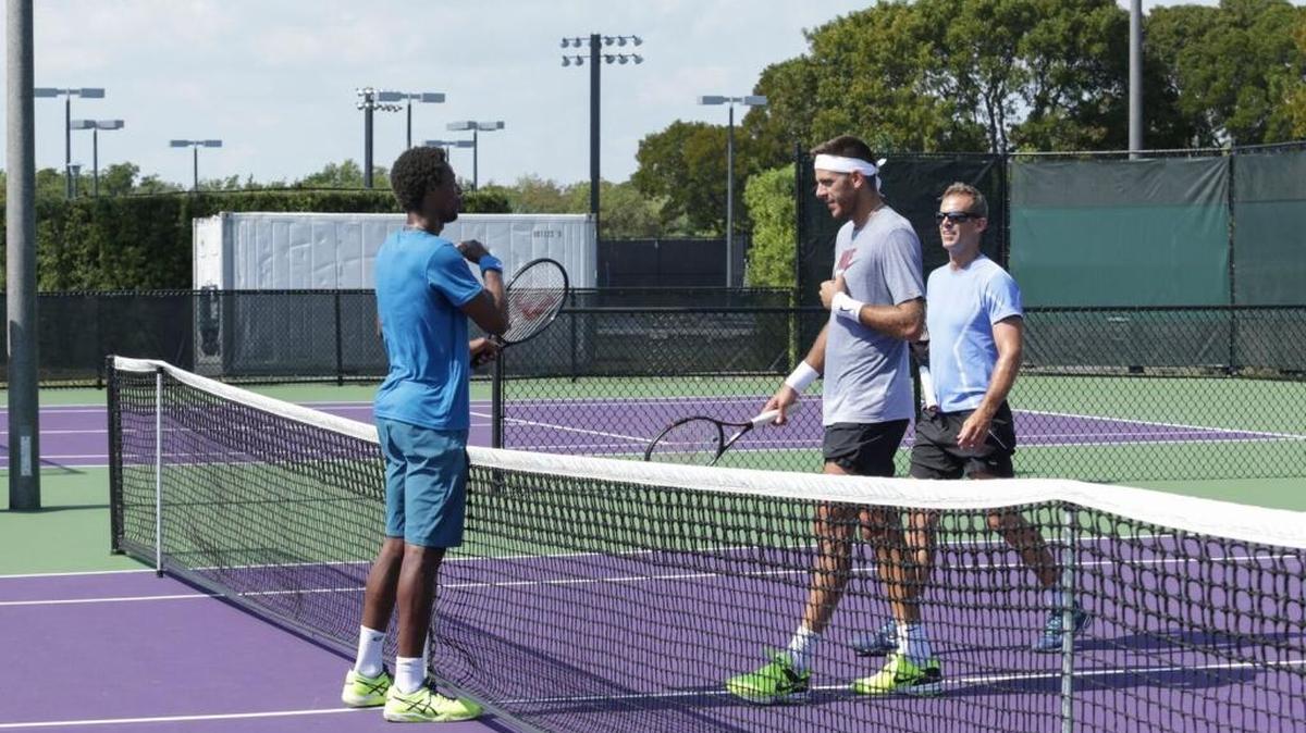 Gael Monfils (left) and Juan Martin del Potro (right) finish a training session together on the Key Biscayne grounds of the Miami Open on Wednesday afternoon.
