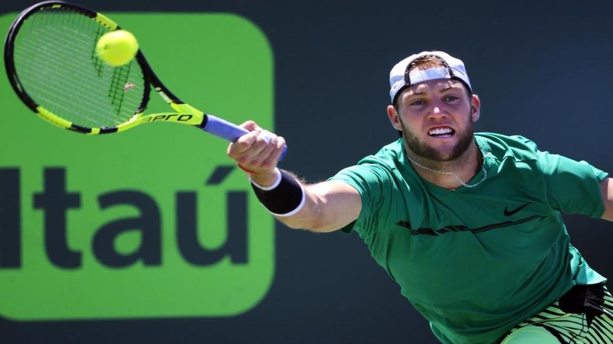 Jack Sock hits to Jared Donaldson at the Miami Open Tennis tournament, presented by Itau, at Crandon Park Tennis Center in Key Biscayne, Florida on Tues., March 28, 2017.