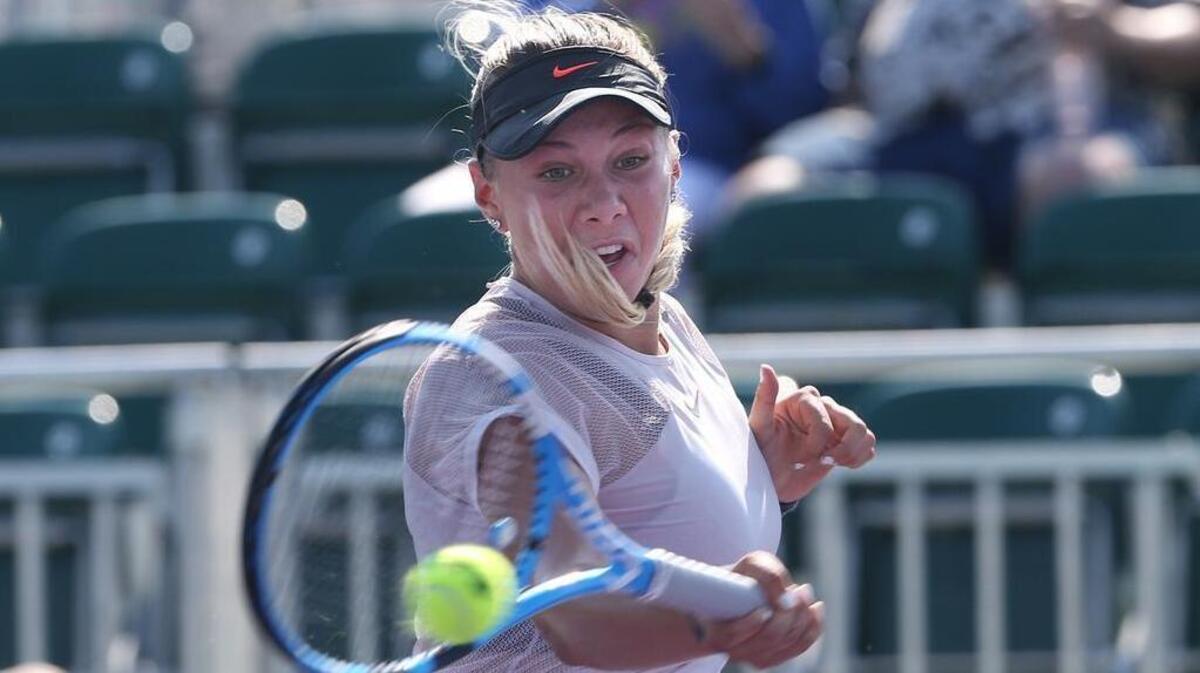 Aventura’s Amanda Anisimova returns a shot against Wang Qiang of China at the Miami Open at Crandon Park Tennis Center on in Key Biscayne on Tuesday, March 20, 2018. Anisimova posted a 6-3, 1-6, 6-2 first-round win.