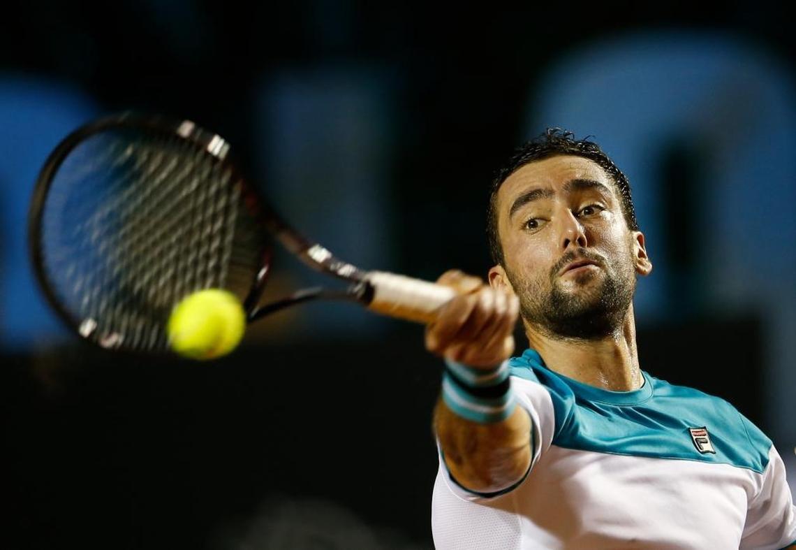 Croatia's Marin Cilic returns the ball to Argentina's Carlos Berlocq during the Rio Open tennis tournament in Rio de Janeiro, Brazil, on Feb. 19, 2018.