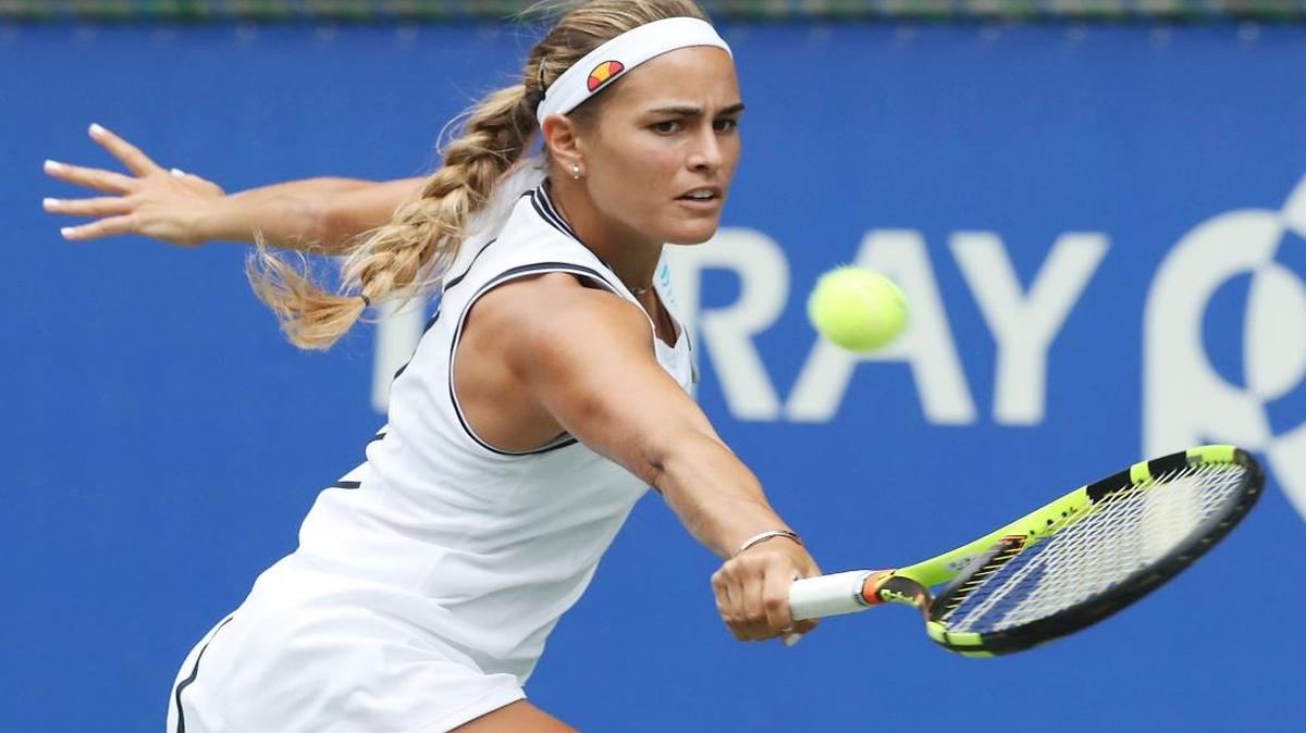 Monica Puig, of Puerto Rico, returns a shot against Petra Kvitova, of the Czech Republic, during the women's singles match at the Pan Pacific Open women's tennis tournament in Tokyo, Wed., Sept. 21, 2016.
