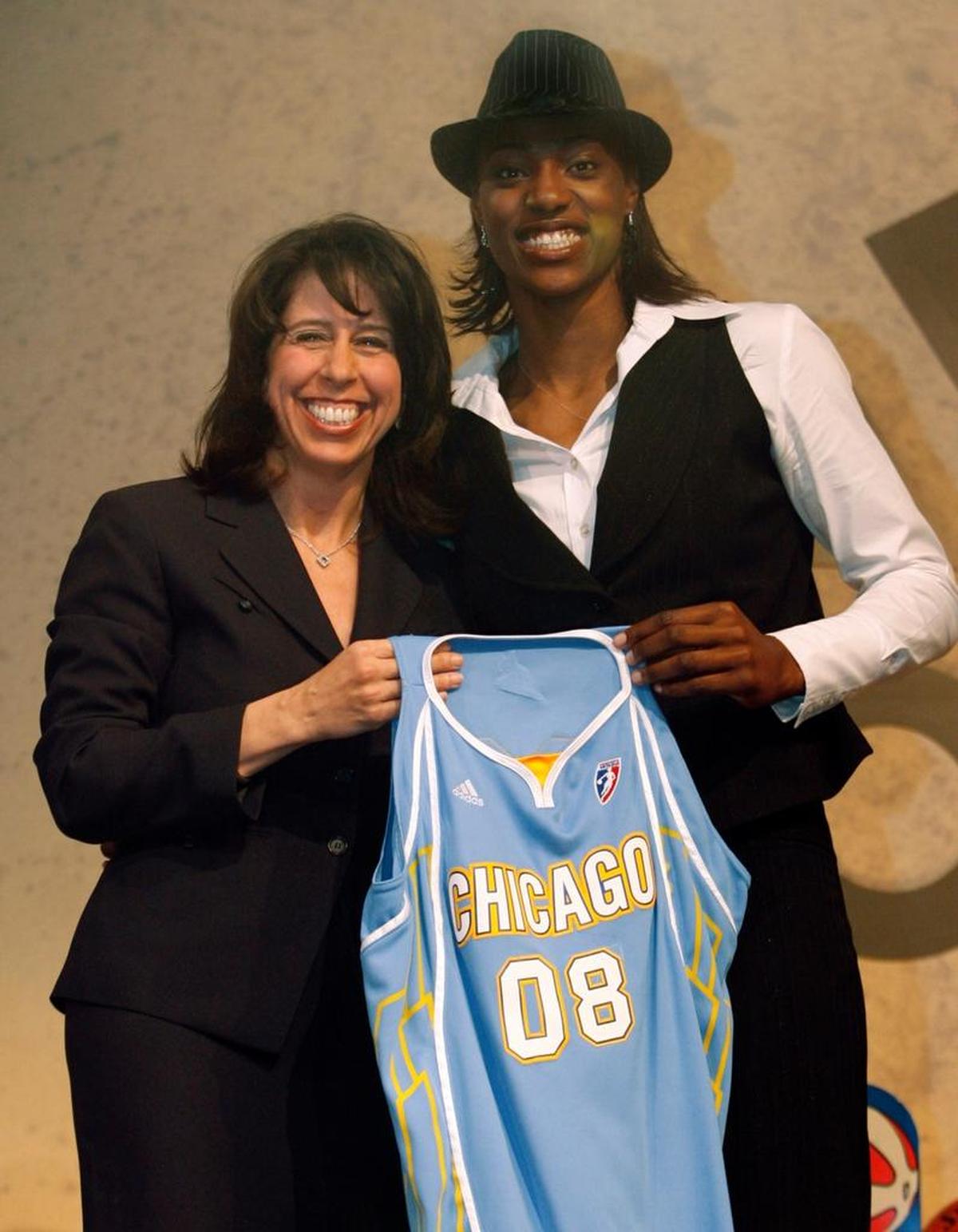 WNBA President Donna Orender, left, and LSU's Sylvia Fowles, hold up a jersey after being Fowles was selected second overall in the first round of the WNBA draft by the Chicago Sky, Wed., April 9, 2008, in Palm Harbor, Fla.