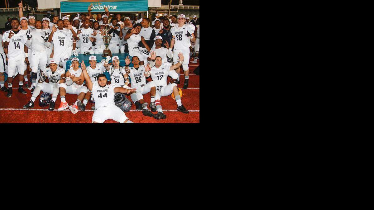 
Miami-Dade County players celebrate winning the Miami-Dade vs. Broward All-Star Football Game, presented by Under Armour, at Traz Powell Stadium in Miami.
