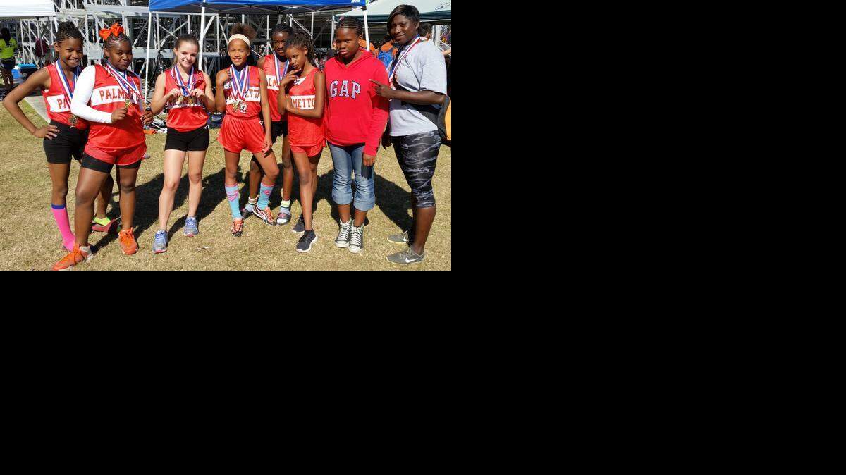 
The Palmetto Middle School girls’ JV track team (sixth-seventh grade) did very well at the Miami-Dade County Middle School Championships at Southridge Park. The standout Lancers are from left, Fairy Stringfield, Lexi Momplaiser, Victoria Karr, Justyce Hill, Navaeh Ezell, Makayla Gardner, Aaliyah Tyler, and Coach Mallie Brown.
