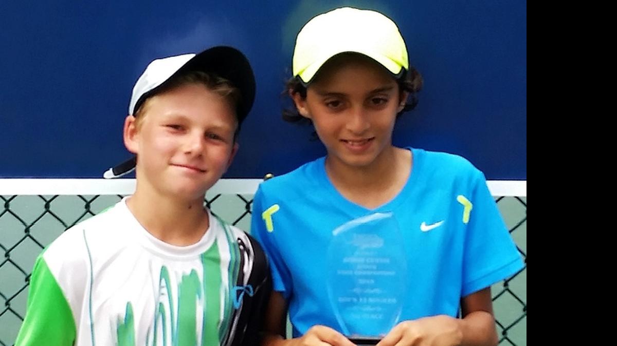 
TOP TENNIS TALENTS: Michael Nicholls (left) of Aventura won the Boys’ 12s title during the 2015 USTA Florida Bobby Curtis Junior State Championships at area sites in Central Florida including the Florida Tennis Center in Daytona Beach. Kian Vakili (right) of Longwood was the runner-up.
