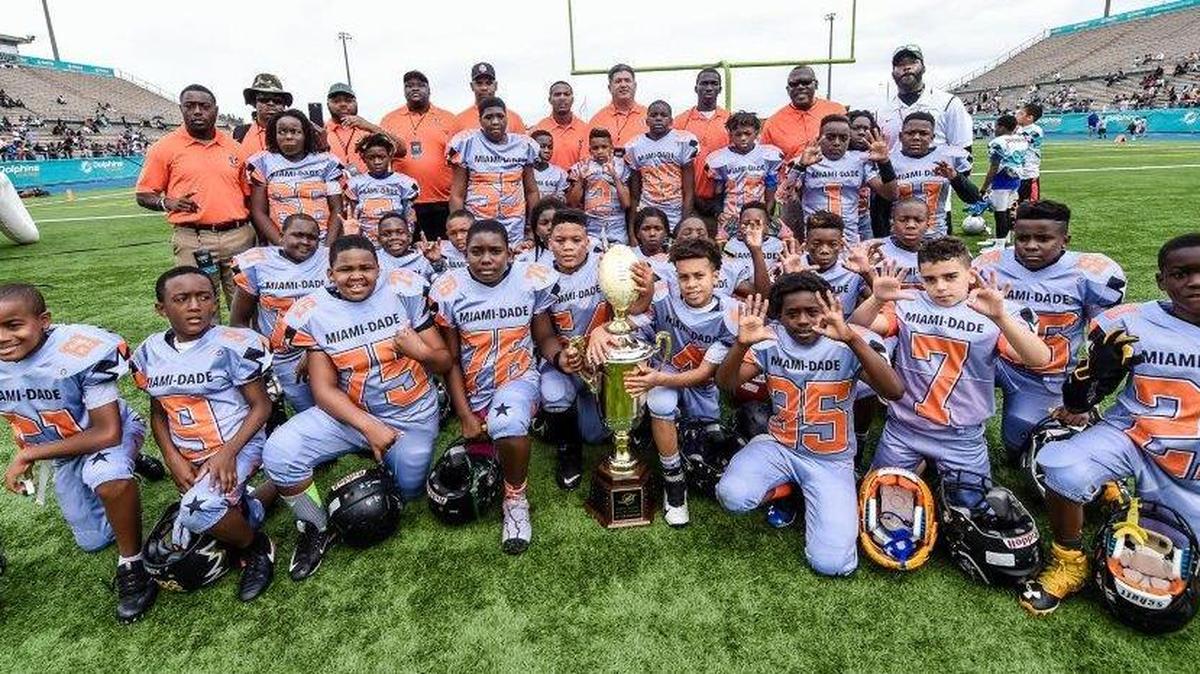 Miami-Dade County defeated Broward County in the 9U Division of the Dade vs. Broward Youth All-Star Football Games presented by Broward College at Traz-Powell Stadium in Miami. The event was hosted by Miami Dolphins Youth Programs in partnership with the Greater Miami Athletic Conference (GMAC) and the Broward County Athletic Association (BCAA).