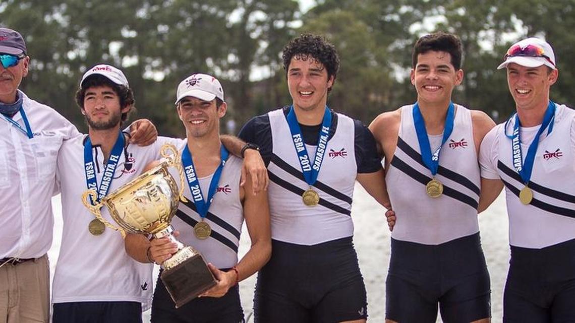 The Miami Rowing Club boys’ varsity heavyweight four won gold during the Florida State High School Rowing Championships at Jonathan Bender Park in Sarasota. The champs are from left, Coach Cesar Herrera, cox Miguel Velez, John Levy, Antonio Ramos, Fabian Herrera and Emil Andreassen.
