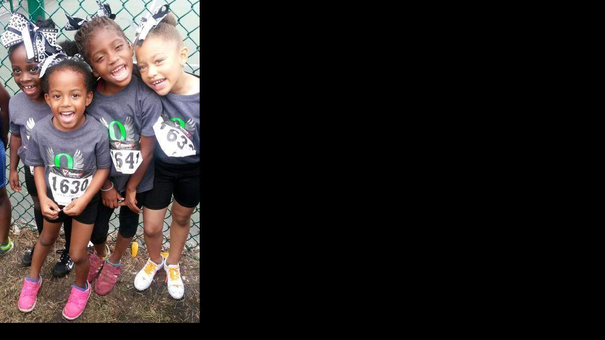 
Happy competitors: From left, Deanna Therancy, Destiny Allen, Jaylah Joseph and Aleya Herron represented the Opa-locka Hurricanes track & field team in the 800-meter run, the long jump and the 400-meter relay in the 6-and-younger division at the seventh annual Moore Park Relays, hosted by the Miami Northwest Express Track Club.
