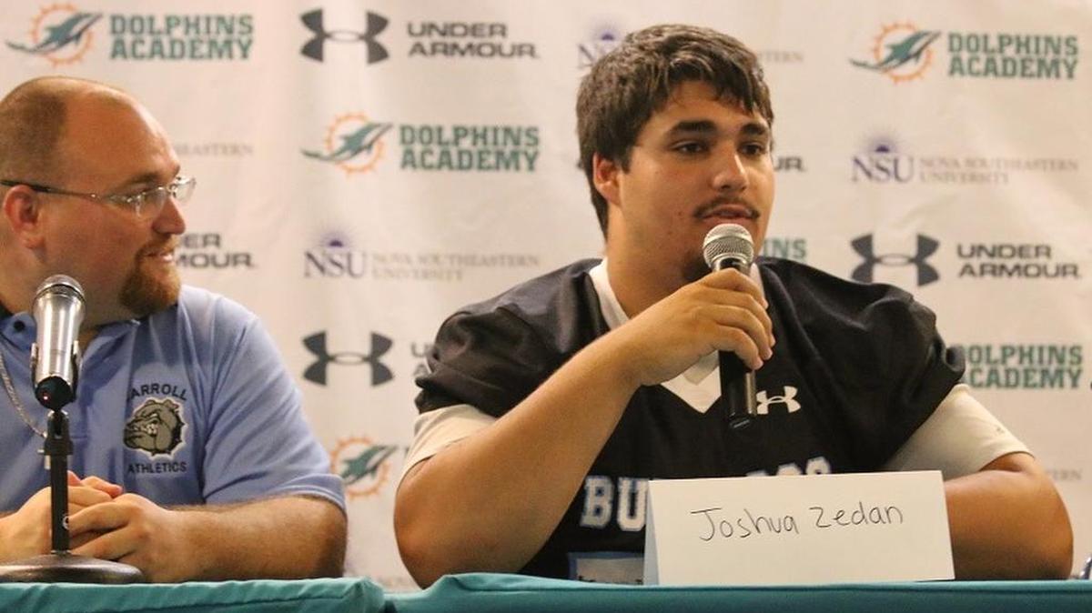 
Archbishop Carroll High School offensive lineman Joshua Zedan answers questions during a press conference at the South Florida High School Football Media Day, hosted by the Miami Dolphins at the Don Taft Arena at Nova Southeastern University in Davie.
