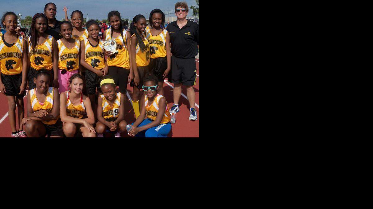 
The Highland Oaks Middle School JV girls’ track & field team (sixth-seventh grade) topped 15 teams to win the Miami-Dade County Championship. The champs are front from left, Naomi Taylor, Kayla Yuegling, Anissa Lespinase, Brianna Easy; back, Jada Joseph, Kyara Walters, Assistant Coach Alissa Griffin, Brook Couri, Rose Clermont, Destiny Desrivieres, Vashti Claybrook, Jadae Barrett, Jadae Jospeh, and Head Coach Matt Tomlinson.
