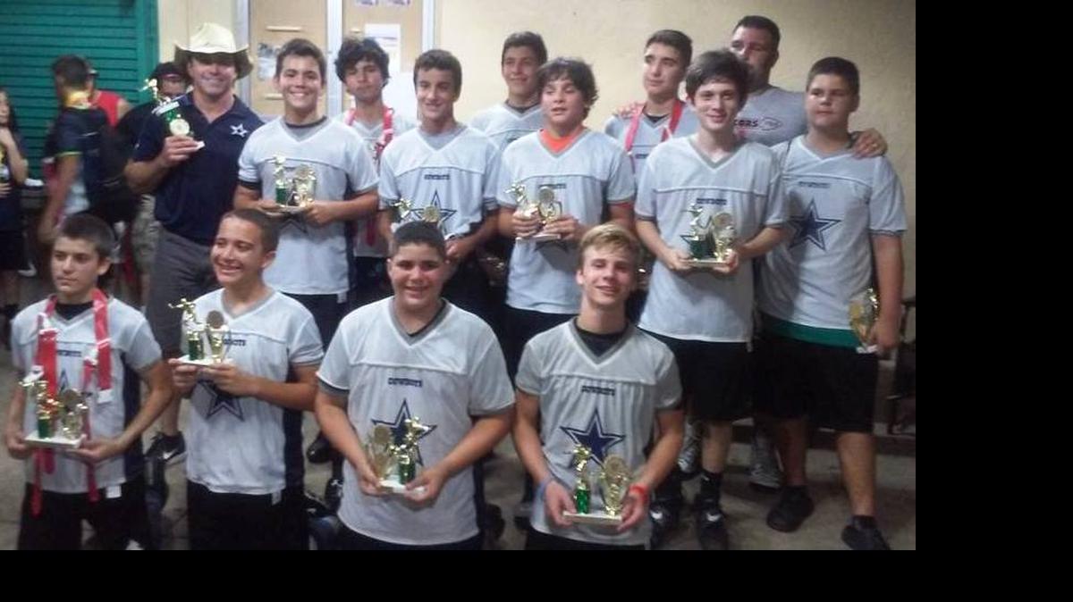 
COWBOY UP: The Cowboys won the U14 Division of Kendall Hammock Optimist NFL Flag Football at Devonaire Park.
