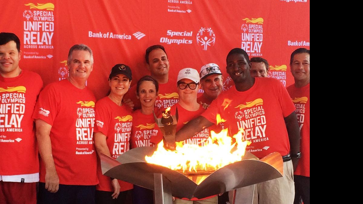 
TORCH CEREMONY: The Special Olympics Flame of Hope makes its historic journey across America on its way to the 2015 Special Olympics World Games in July in Los Angeles. Miami kicked off one of three simultaneous routes in the Unified Relay Across America, presented by Bank of America, at Marlins Park. The lighting of the torch included Bank of America dignitaries, other donors, supporters and local Special Olympics athletes.
